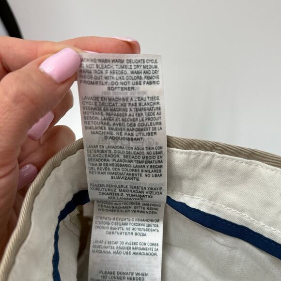 Tan dockers dress plants tag size 32x34. Measure 35” x 30.5” x 11.5” i - Picture 6 of 6